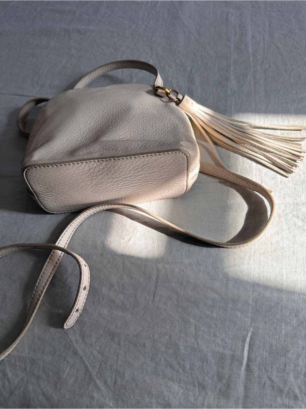 HOBO Ivory Nash Crossbody Bag | Pebbled Leather Tassel Gold Hardware - Picture 16 of 16